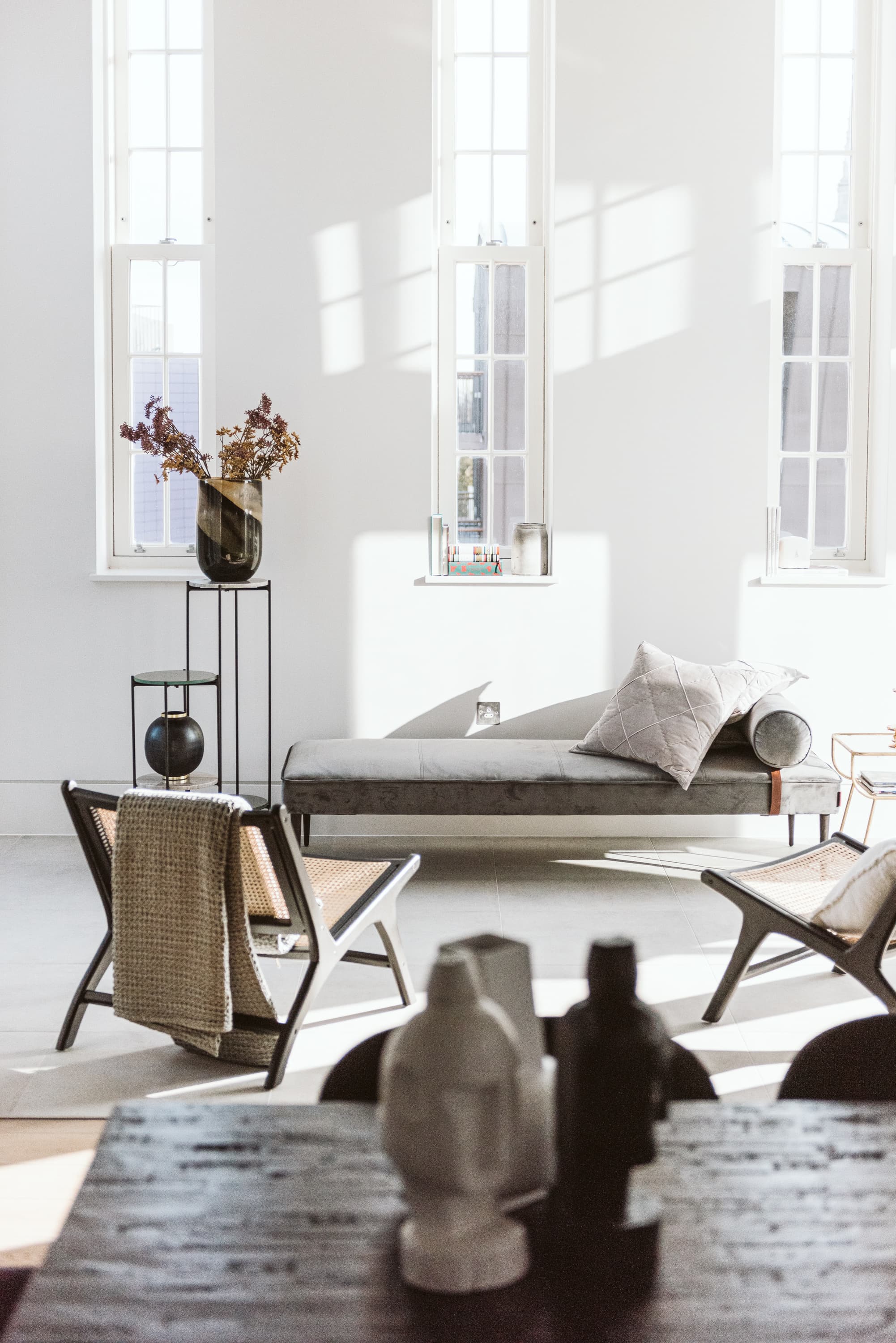 Styled London interior — living room with daybed and sculptural furniture