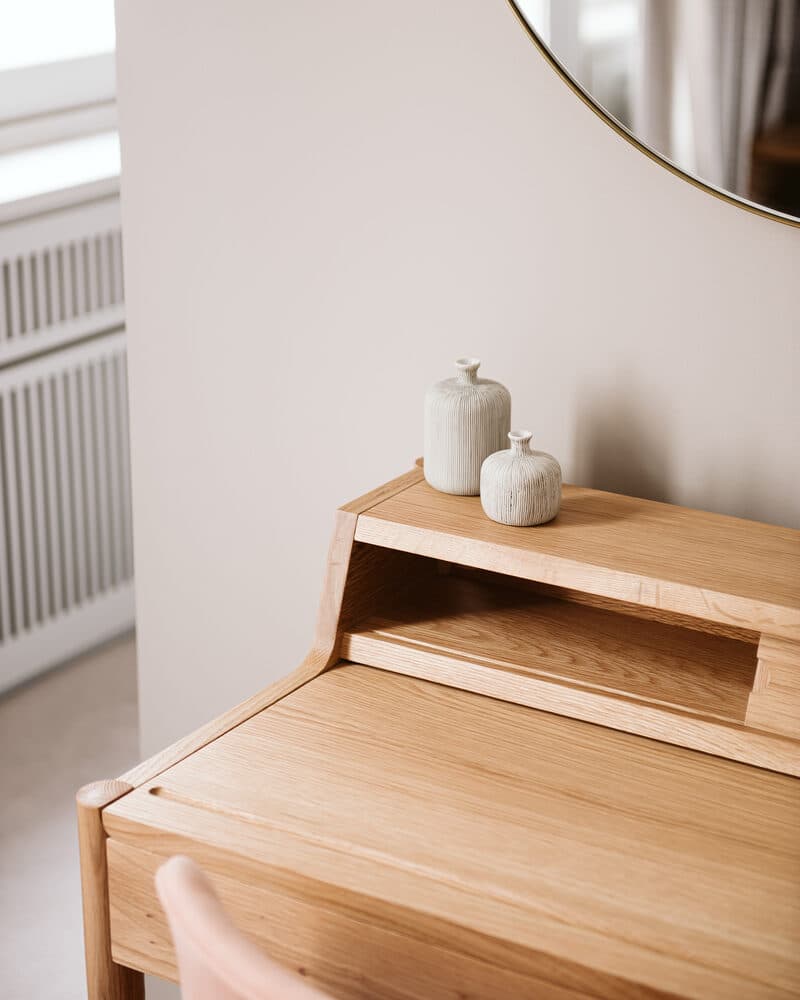 Styled dressing table detail in a London property kept in careful order
